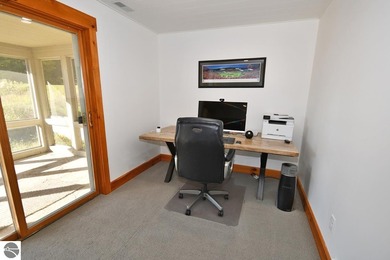 Welcome to this stunning home! Chimney Ridge 8 is situated along on Mountain Flowers Golf Course in Michigan - for sale on GolfHomes.com, golf home, golf lot