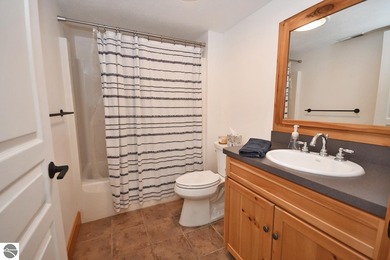 Welcome to this stunning home! Chimney Ridge 8 is situated along on Mountain Flowers Golf Course in Michigan - for sale on GolfHomes.com, golf home, golf lot