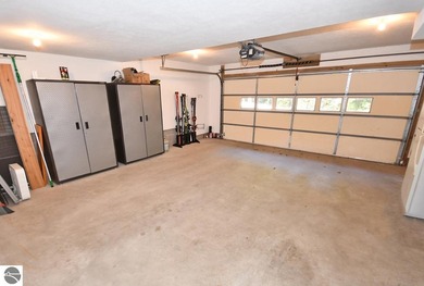 Welcome to this stunning home! Chimney Ridge 8 is situated along on Mountain Flowers Golf Course in Michigan - for sale on GolfHomes.com, golf home, golf lot