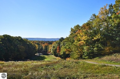 Welcome to this stunning home! Chimney Ridge 8 is situated along on Mountain Flowers Golf Course in Michigan - for sale on GolfHomes.com, golf home, golf lot