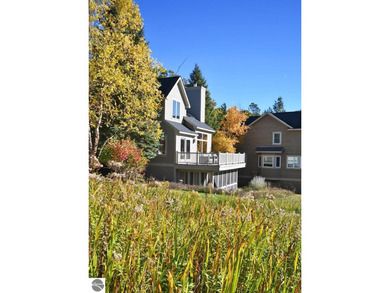Welcome to this stunning home! Chimney Ridge 8 is situated along on Mountain Flowers Golf Course in Michigan - for sale on GolfHomes.com, golf home, golf lot