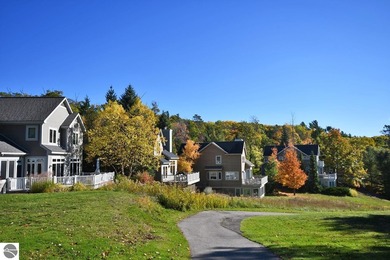 Welcome to this stunning home! Chimney Ridge 8 is situated along on Mountain Flowers Golf Course in Michigan - for sale on GolfHomes.com, golf home, golf lot