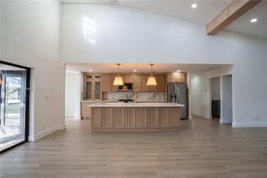 Step inside this freshly remodeled 3-bed, 2-bath pool home with on The Forest Country Club in Florida - for sale on GolfHomes.com, golf home, golf lot