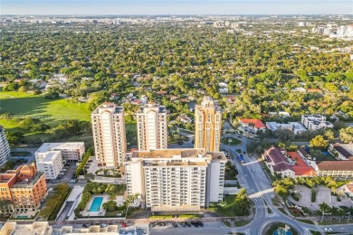 Wake up to treetop views and end your day with a stroll to on Granada Golf Club in Florida - for sale on GolfHomes.com, golf home, golf lot