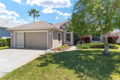You'll love this beautiful, concrete block stucco home with so on Royal Oaks Golf Club in Florida - for sale on GolfHomes.com, golf home, golf lot