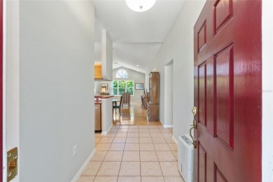 You'll love this beautiful, concrete block stucco home with so on Royal Oaks Golf Club in Florida - for sale on GolfHomes.com, golf home, golf lot