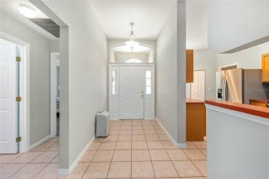 You'll love this beautiful, concrete block stucco home with so on Royal Oaks Golf Club in Florida - for sale on GolfHomes.com, golf home, golf lot