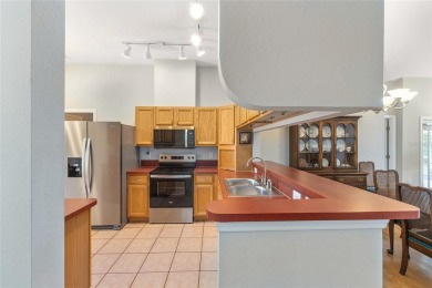 You'll love this beautiful, concrete block stucco home with so on Royal Oaks Golf Club in Florida - for sale on GolfHomes.com, golf home, golf lot