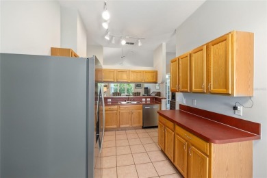 You'll love this beautiful, concrete block stucco home with so on Royal Oaks Golf Club in Florida - for sale on GolfHomes.com, golf home, golf lot