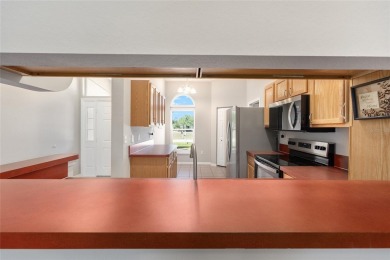 You'll love this beautiful, concrete block stucco home with so on Royal Oaks Golf Club in Florida - for sale on GolfHomes.com, golf home, golf lot