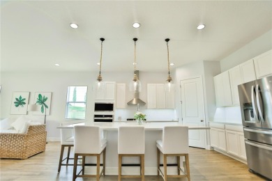 golf views. The home has interior upgrades with elegance and on Bella Collina Golf Club in Florida - for sale on GolfHomes.com, golf home, golf lot