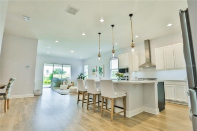 golf views. The home has interior upgrades with elegance and on Bella Collina Golf Club in Florida - for sale on GolfHomes.com, golf home, golf lot