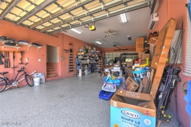 A BOATERS DREAM HOME!! 5 MINUTES TO OPEN WATER, 60 MINUTES TO on Port Charlotte Golf Club in Florida - for sale on GolfHomes.com, golf home, golf lot