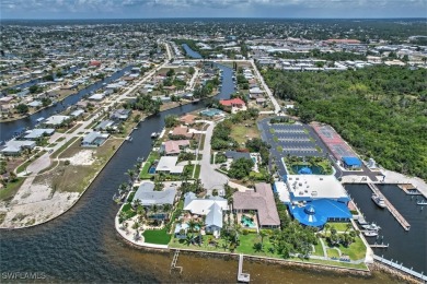 A BOATERS DREAM HOME!! 5 MINUTES TO OPEN WATER, 60 MINUTES TO on Port Charlotte Golf Club in Florida - for sale on GolfHomes.com, golf home, golf lot