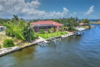 A BOATERS DREAM HOME!! 5 MINUTES TO OPEN WATER, 60 MINUTES TO on Port Charlotte Golf Club in Florida - for sale on GolfHomes.com, golf home, golf lot