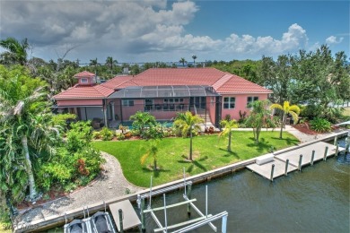 A BOATERS DREAM HOME!! 5 MINUTES TO OPEN WATER, 60 MINUTES TO on Port Charlotte Golf Club in Florida - for sale on GolfHomes.com, golf home, golf lot