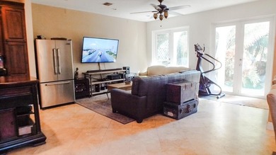 Beautifully maintained coastal home located near the beach and on Lake Worth Municipal Golf Course in Florida - for sale on GolfHomes.com, golf home, golf lot