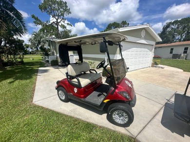 This beautiful Palm Harbour stucco home is located on the golf on Del Tura Golf and Country Club in Florida - for sale on GolfHomes.com, golf home, golf lot
