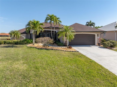 Welcome to this beautifully maintained 3-bedroom, plus a den on Royal Tee Country Club in Florida - for sale on GolfHomes.com, golf home, golf lot