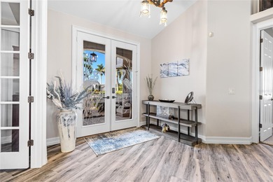 Welcome to this beautifully maintained 3-bedroom, plus a den on Royal Tee Country Club in Florida - for sale on GolfHomes.com, golf home, golf lot