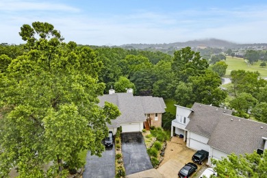 Nestled on a desirable corner lot, this exquisite 2-bedroom, 2 on Pointe Royale Village Country Club in Missouri - for sale on GolfHomes.com, golf home, golf lot