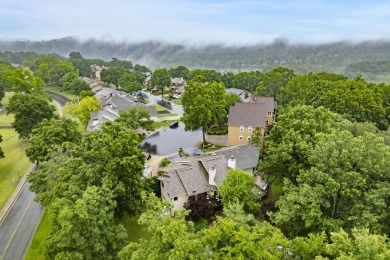 Nestled on a desirable corner lot, this exquisite 2-bedroom, 2 on Pointe Royale Village Country Club in Missouri - for sale on GolfHomes.com, golf home, golf lot