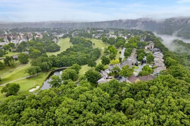 Nestled on a desirable corner lot, this exquisite 2-bedroom, 2 on Pointe Royale Village Country Club in Missouri - for sale on GolfHomes.com, golf home, golf lot