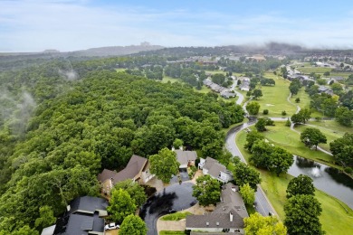 Nestled on a desirable corner lot, this exquisite 2-bedroom, 2 on Pointe Royale Village Country Club in Missouri - for sale on GolfHomes.com, golf home, golf lot