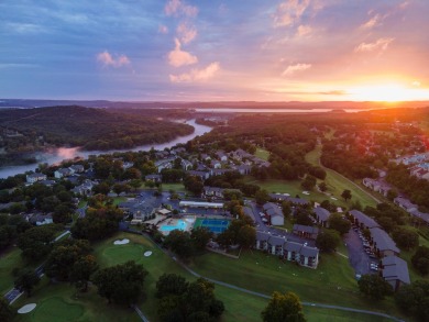 Nestled on a desirable corner lot, this exquisite 2-bedroom, 2 on Pointe Royale Village Country Club in Missouri - for sale on GolfHomes.com, golf home, golf lot