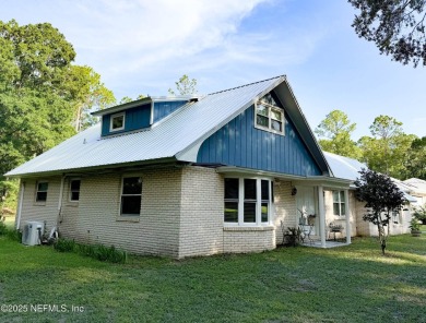 This 2 story, 4-bedroom, 2-bath home is nestled in an area near on Starke Golf and Country Club in Florida - for sale on GolfHomes.com, golf home, golf lot