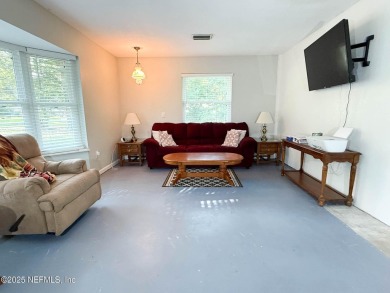 This 2 story, 4-bedroom, 2-bath home is nestled in an area near on Starke Golf and Country Club in Florida - for sale on GolfHomes.com, golf home, golf lot