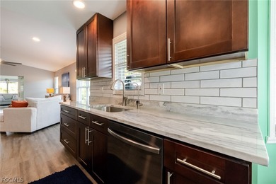 Welcome to this truly completely renovated Laconia model in the on Herons Glen Golf and Country Club in Florida - for sale on GolfHomes.com, golf home, golf lot