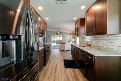 Welcome to this truly completely renovated Laconia model in the on Herons Glen Golf and Country Club in Florida - for sale on GolfHomes.com, golf home, golf lot