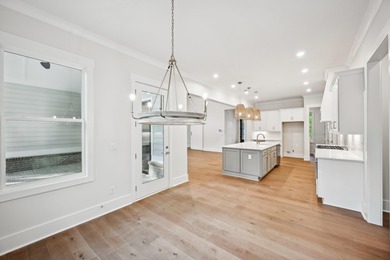 THERE'S SOMETHING MAGICAL ABOUT STEPPING INTO A NEW HOME, A on Harbor Club Golf and Country Club in Georgia - for sale on GolfHomes.com, golf home, golf lot