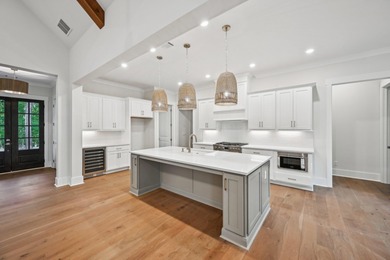 THERE'S SOMETHING MAGICAL ABOUT STEPPING INTO A NEW HOME, A on Harbor Club Golf and Country Club in Georgia - for sale on GolfHomes.com, golf home, golf lot