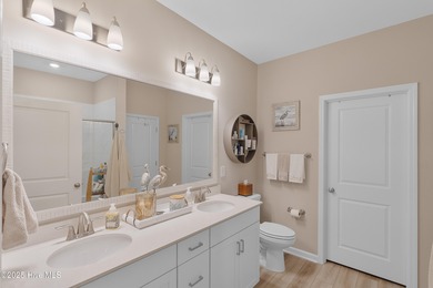 Discover Your Own Slice of Paradise! This stunning 2-bedroom on Brunswick Plantation and Golf Resorts in North Carolina - for sale on GolfHomes.com, golf home, golf lot