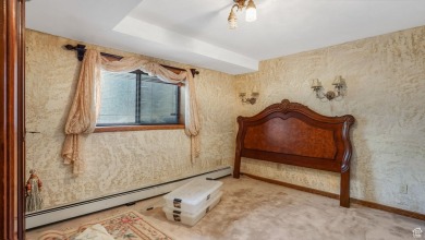 This captivating home is nestled in a quiet cul de sac within a on Old Mill Golf Course in Utah - for sale on GolfHomes.com, golf home, golf lot