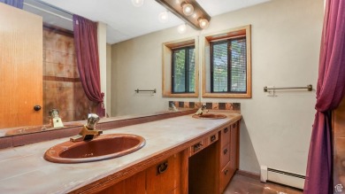 This captivating home is nestled in a quiet cul de sac within a on Old Mill Golf Course in Utah - for sale on GolfHomes.com, golf home, golf lot