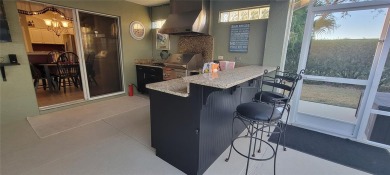 Welcome to this stunning LANTANA with HEATED POOL home, SPA on The Links of Spruce Creek in Florida - for sale on GolfHomes.com, golf home, golf lot