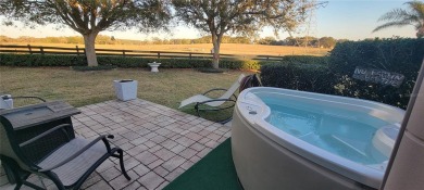 Welcome to this stunning LANTANA with HEATED POOL home, SPA on The Links of Spruce Creek in Florida - for sale on GolfHomes.com, golf home, golf lot