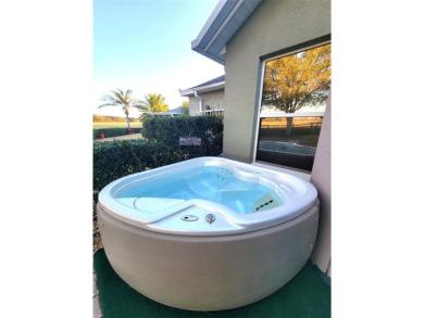 Welcome to this stunning LANTANA with HEATED POOL home, SPA on The Links of Spruce Creek in Florida - for sale on GolfHomes.com, golf home, golf lot