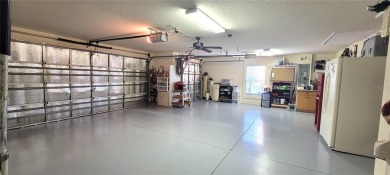 Welcome to this stunning LANTANA with HEATED POOL home, SPA on The Links of Spruce Creek in Florida - for sale on GolfHomes.com, golf home, golf lot