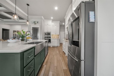Lock in an assumable 2.5% interest rate and a home that's truly on Lakeside Golf Course in Oklahoma - for sale on GolfHomes.com, golf home, golf lot
