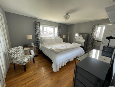 Your search ends here with this spacious 4-bedroom 3 bath on Middle Bay Country Club in New York - for sale on GolfHomes.com, golf home, golf lot