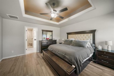 Lock in an assumable 2.5% interest rate and a home that's truly on Lakeside Golf Course in Oklahoma - for sale on GolfHomes.com, golf home, golf lot