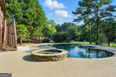 Live the ultimate resort-style lifestyle in this stunning on Hamilton Mill Golf Club in Georgia - for sale on GolfHomes.com, golf home, golf lot