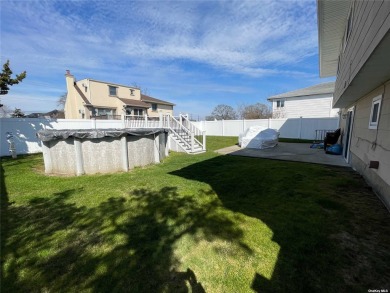 Your search ends here with this spacious 4-bedroom 3 bath on Middle Bay Country Club in New York - for sale on GolfHomes.com, golf home, golf lot