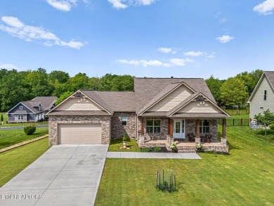 All-brick home with many upgrades is located within the Tellico on Tellico Village -The Links At Kahite Golf Course in Tennessee - for sale on GolfHomes.com, golf home, golf lot