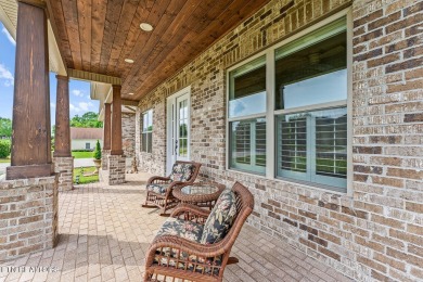 All-brick home with many upgrades is located within the Tellico on Tellico Village -The Links At Kahite Golf Course in Tennessee - for sale on GolfHomes.com, golf home, golf lot