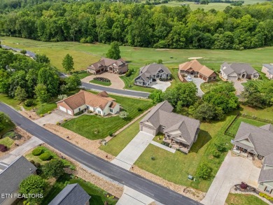 All-brick home with many upgrades is located within the Tellico on Tellico Village -The Links At Kahite Golf Course in Tennessee - for sale on GolfHomes.com, golf home, golf lot
